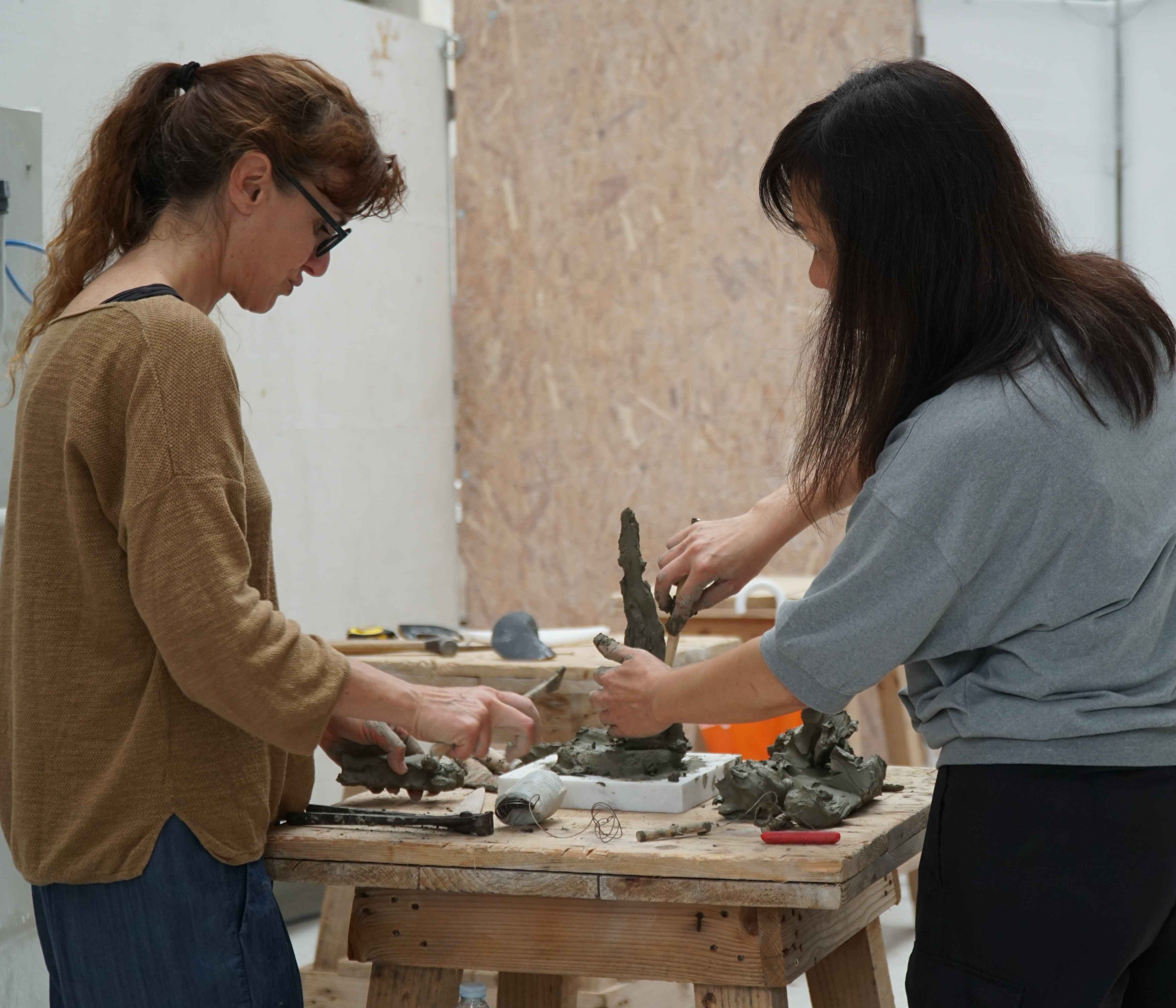 Flavia Robalo and Violet Shum working together during Fusion 3