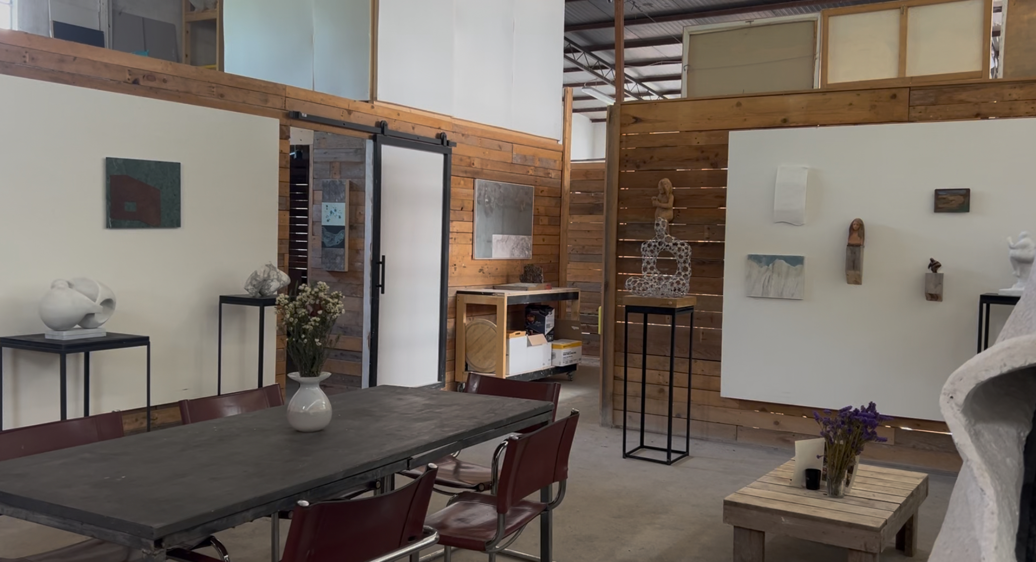 Art and furniture inside the studio